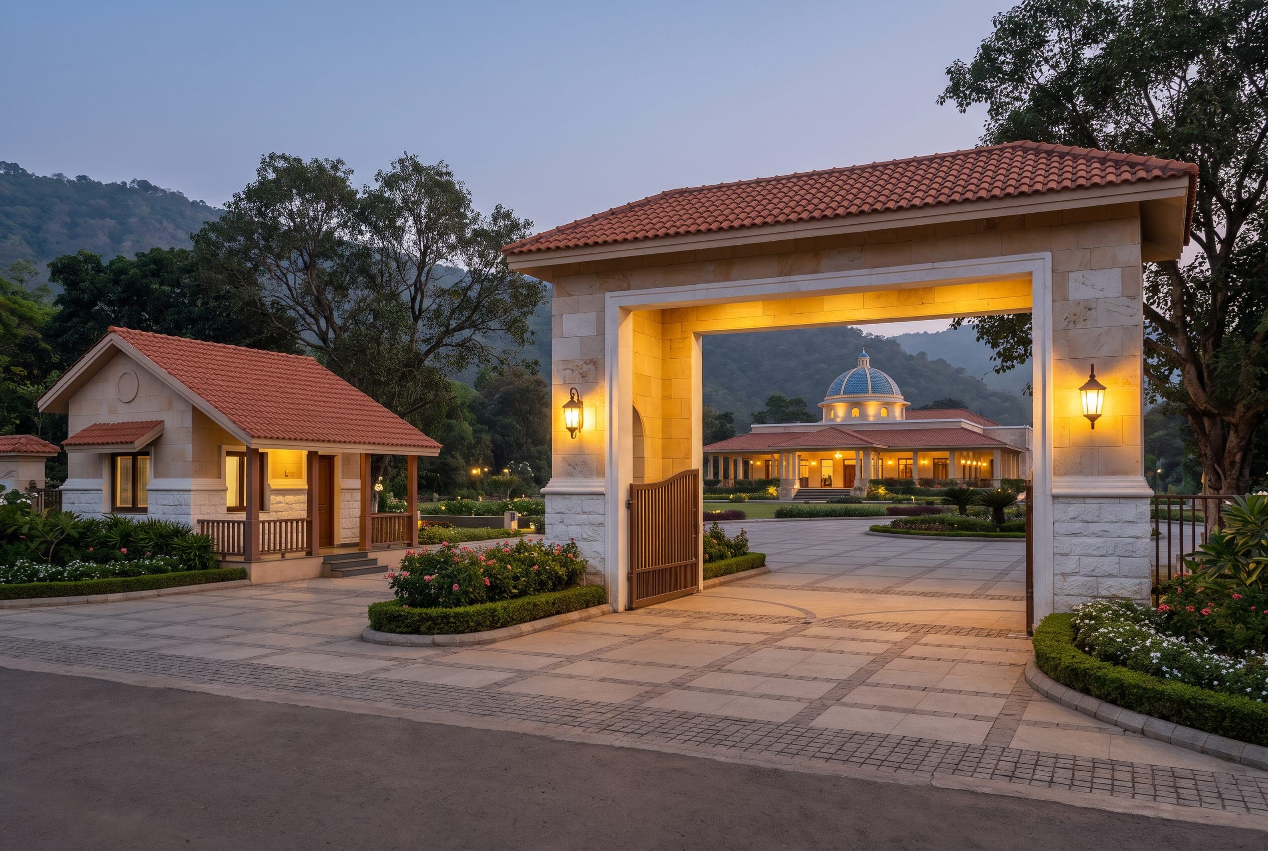 The monumental entrance gate of JagKalyan Tarak Gurukul at dusk